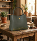 HAVENGOTT Emerald Structure Bucket Bag – Genuine Pebbled Leather with Gold Floral Accent